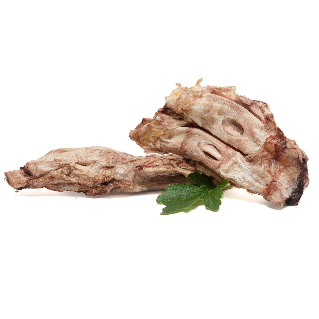 Two pieces of Beast Feast Freeze-Dried Bison Half Flexor Tendon on a white background.