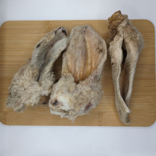 A group of Beast Feast Wooly Sheep Ear low-fat food on a cutting board.