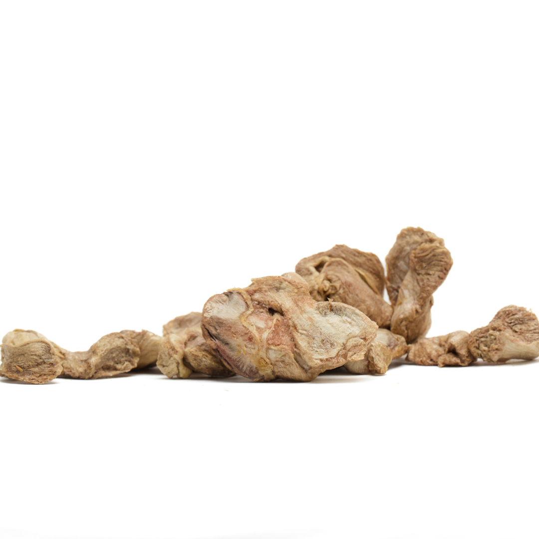 A pile of Beast Feast freeze-dried chicken gizzards on a GAP Step 4 certified white background.